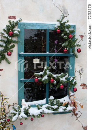 Window with Christmas decoration Window with Christmas decoration 7252376