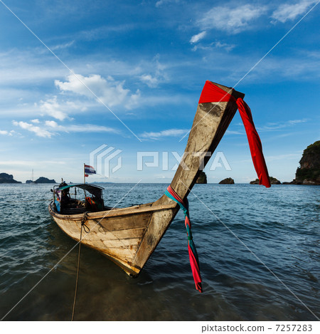 Long tail boat on beach, Thailand 7257283