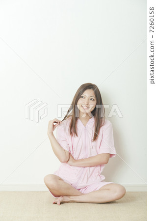 A woman relaxing in the room 7260158