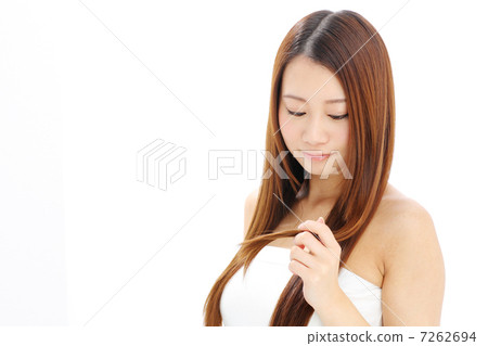 Girls looking at their tips Girls looking at their tips 7262694