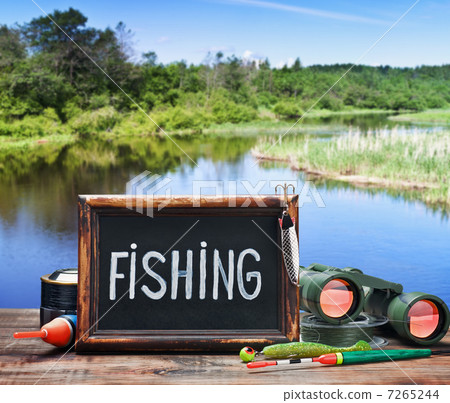 fishing tackle and a blackboard 7265244