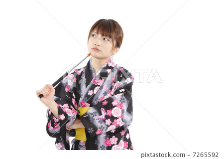 一個女人穿著浴衣與指針 一個女人穿著浴衣與指針 7265592