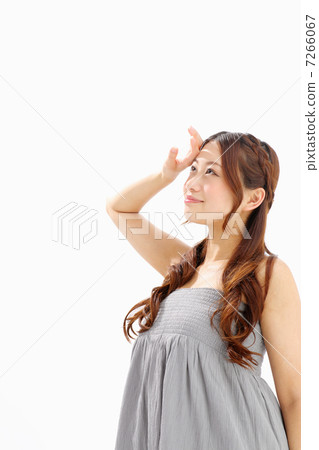 Girl shielding the sun Girl shielding the sun 7266067