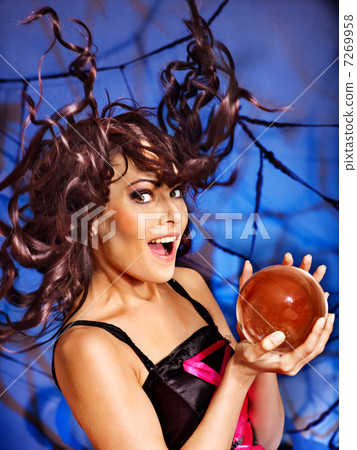 Young woman with crystal ball. Young woman with crystal ball. 7269958
