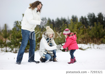 Happy family on a winter day 7293321