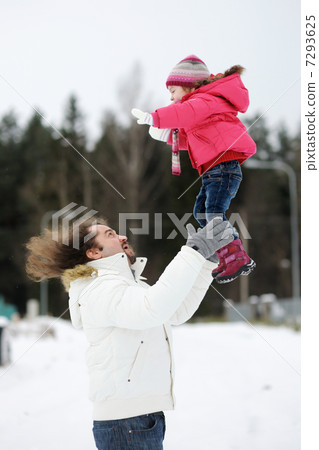 Young father and his toddler girl on a winter day Young father and his toddler girl on a winter day 7293625