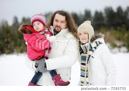 Happy family on a winter day Happy family on a winter day 7293735