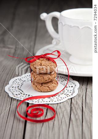 Cup of tea and cookies on wooden background Cup of tea and cookies on wooden background 7294034