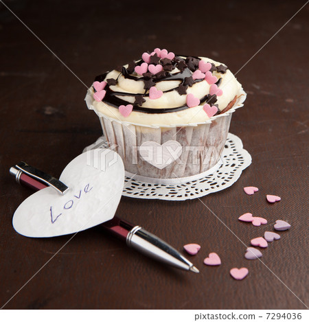 Vanilla cupcake on a table Vanilla cupcake on a table 7294036