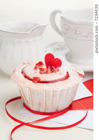 Strawberry cupcake on a table 7294038