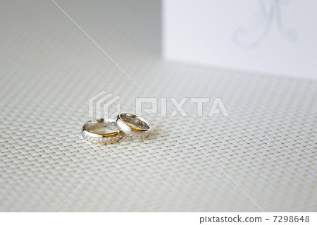 Two wedding rings and wedding invitation Two wedding rings and wedding invitation 7298648
