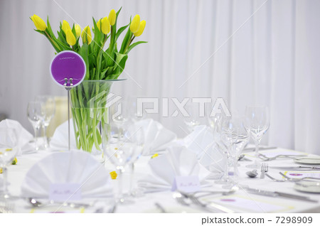 Beautiful yellow tulips on a festive table 7298909