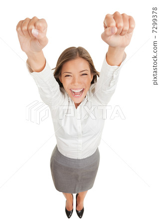 Ecstatic woman cheering and winning 7299378