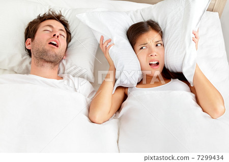 Snoring man - couple in bed 7299434