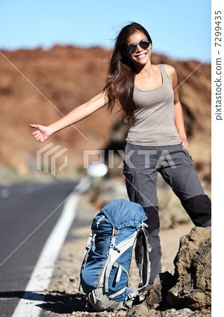 Travel hitchhiker woman happy 7299435
