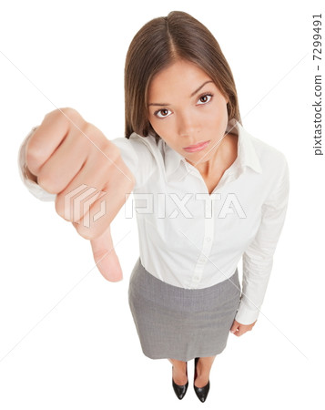 Sad business woman making a thumbs down sign 7299491