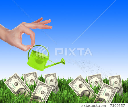 Hand with a small watering 7300357