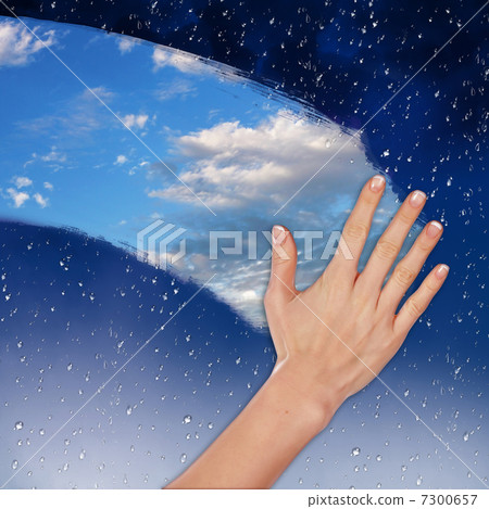 Window with blue sky and white clouds 7300657