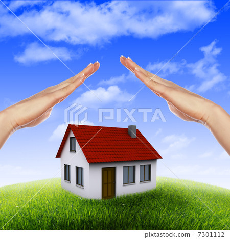 House in the hands against the blue sky 7301112
