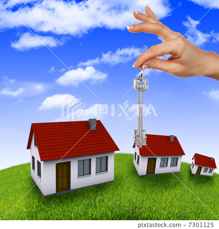 House in the hands against the blue sky 7301125