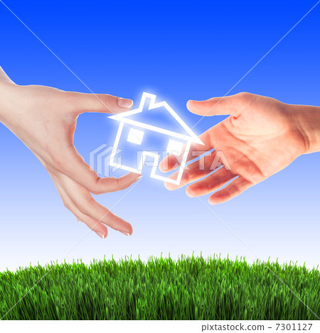 House in the hands against the blue sky House in the hands against the blue sky 7301127