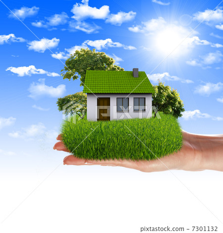 House in the hands against the blue sky 7301132