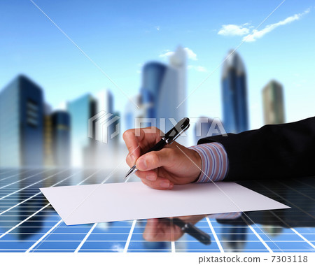 Businessman hand signing documents 7303118