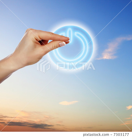 Power button against sky background Power button against sky background 7303177