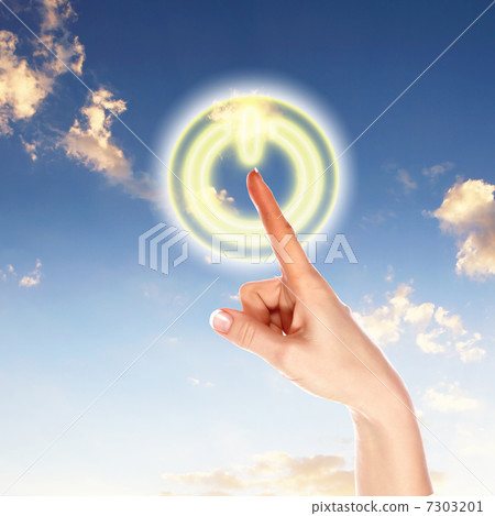 Power button against sky background 7303201
