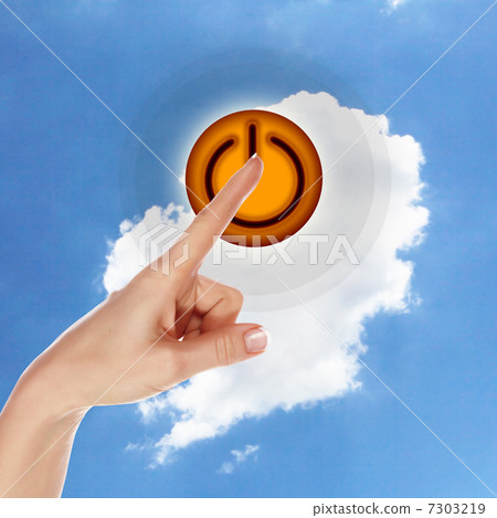 Power button against sky background 7303219