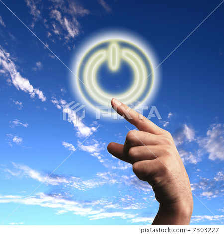 Power button against sky background 7303227