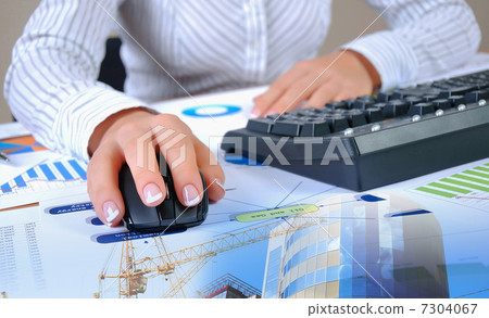 Charts, diagrams, documents on the desktop 7304067