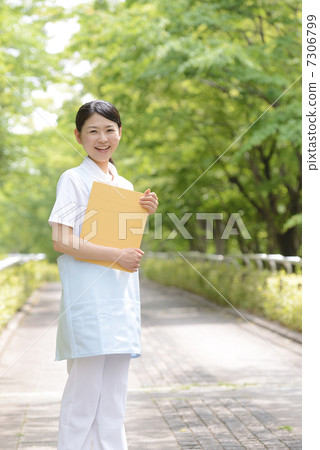 Fresh green female caregiver Fresh green female caregiver 7306799