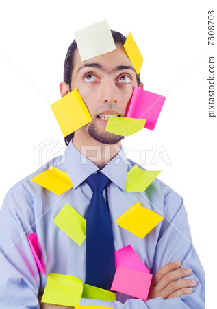 Man with lots of reminder notes 7308703