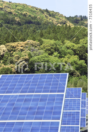 Mega solar facility and mountains and blue sky 7316435