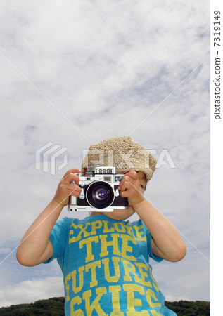 一位小型攝影師用測距儀拍攝 一位小型攝影師用測距儀拍攝 7319149