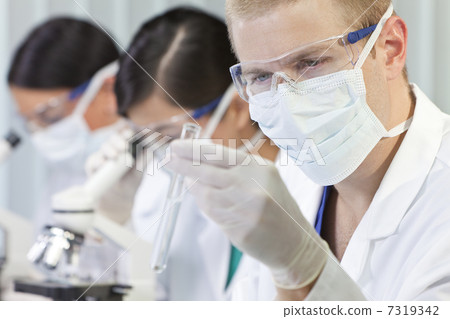Male Scientist or Doctor With Test Tube In Laboratory 7319342