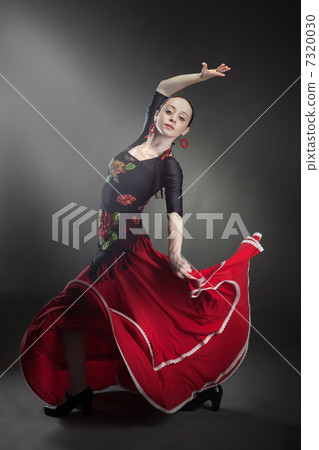 young woman dancing flamenco on black young woman dancing flamenco on black 7320030