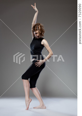 attractive young woman dancing attractive young woman dancing 7320090