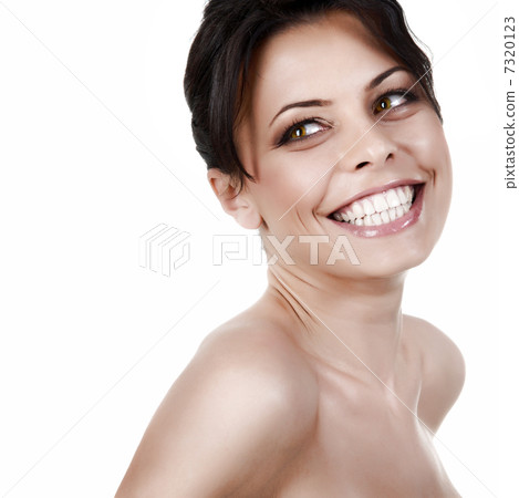 Smiling beautiful woman isolated on white Smiling beautiful woman isolated on white 7320123