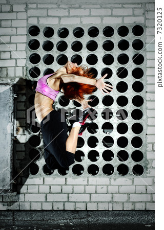 girl jumping on the roof girl jumping on the roof 7320125