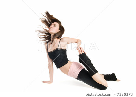 Posing young dancer isolated on white background Posing young dancer isolated on white background 7320373