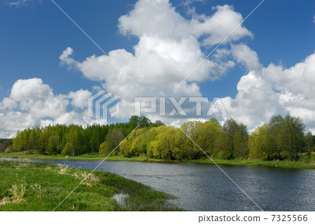 Clouds over the river 7325566