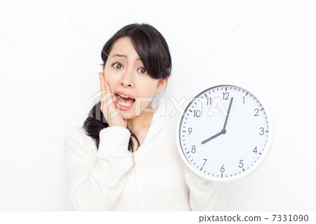 A woman with a watch A woman with a watch 7331090