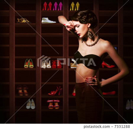 Confusion. Upset Woman Choosing what to Wear. Wardrobe with Footwear 7331288