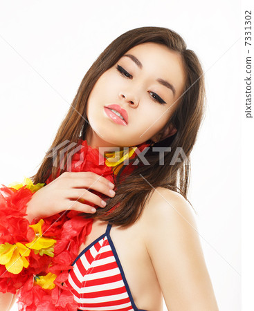Femininity. Portrait of Asian Woman with Colorful Origami Flowers Femininity. Portrait of Asian Woman with Colorful Origami Flowers 7331302