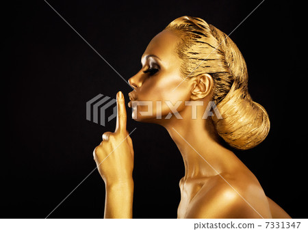 Secrecy. Bodyart. Golden Woman showing Silence Sign. Hush! Secrecy. Bodyart. Golden Woman showing Silence Sign. Hush! 7331347