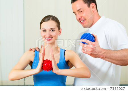 Patient at the physiotherapy doing physical therapy 7332027
