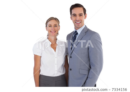 Smiling co workers standing together Smiling co workers standing together 7334156