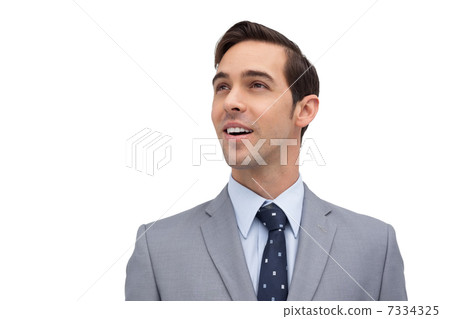 Smiling businessman looking away 7334325